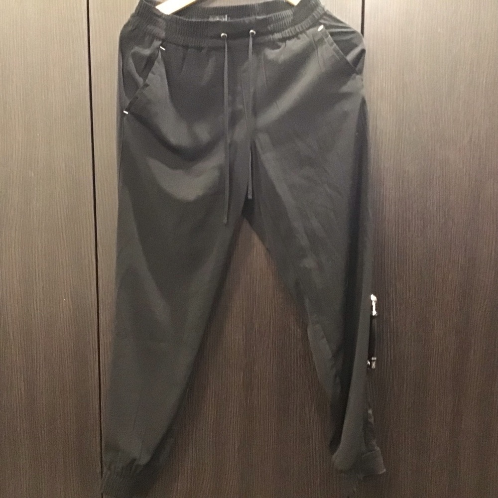 Black soft jogger pant with silver cliff from Dynamite store